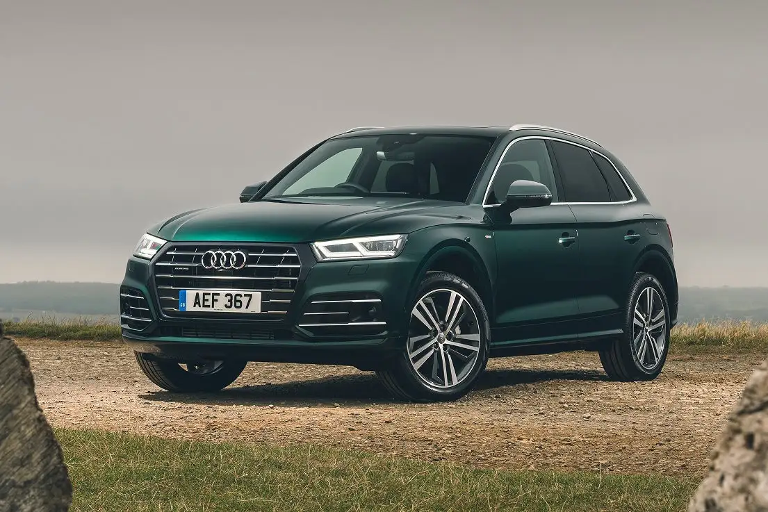 green audi q5 in an outdoor setting.