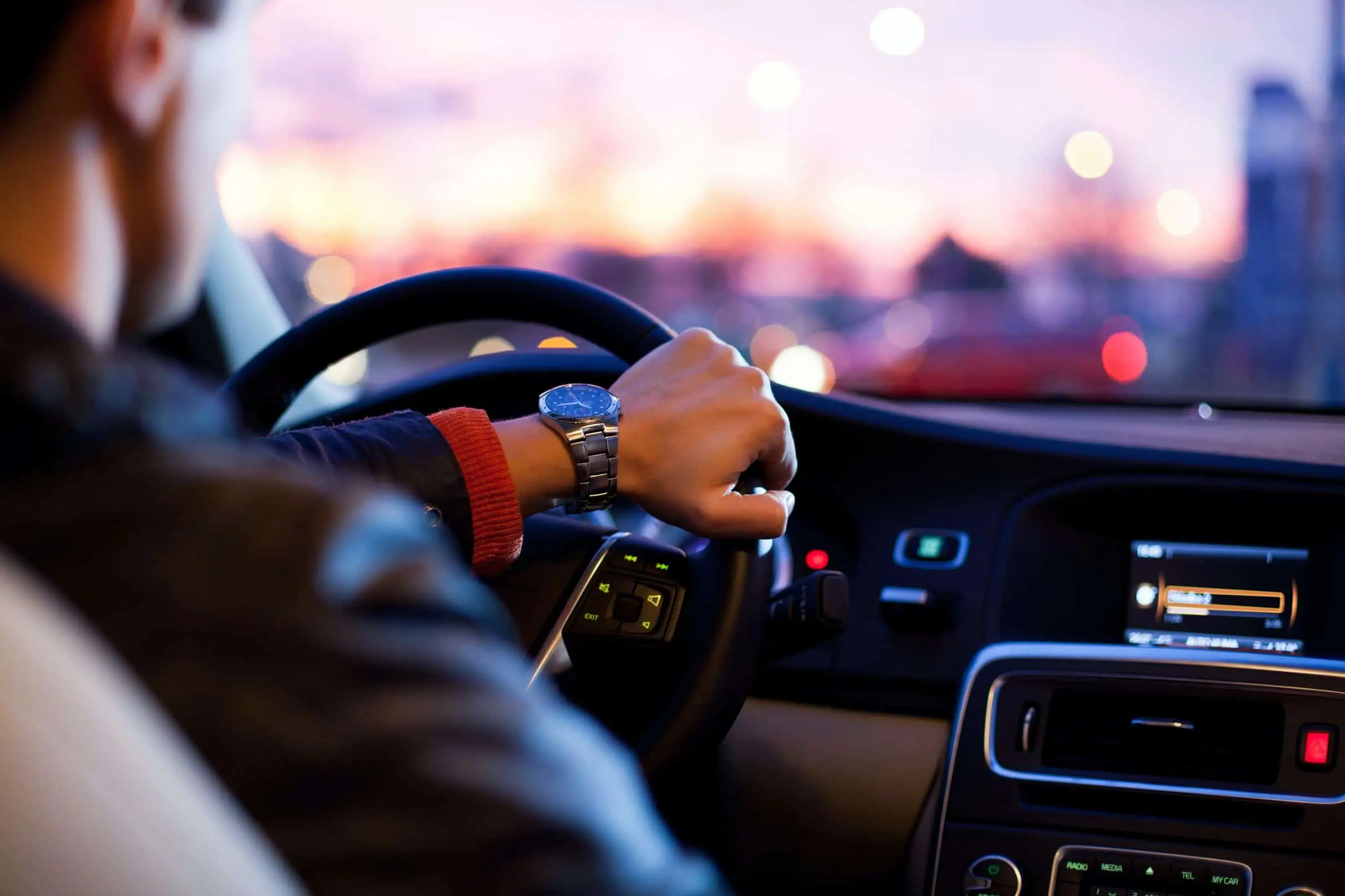 Self-employed person reviewing car finance options Title: Self-Employed Car Finance Guide Description: A self-employed individual reviewing documents and exploring car finance options to secure a loan for their vehicle purchase