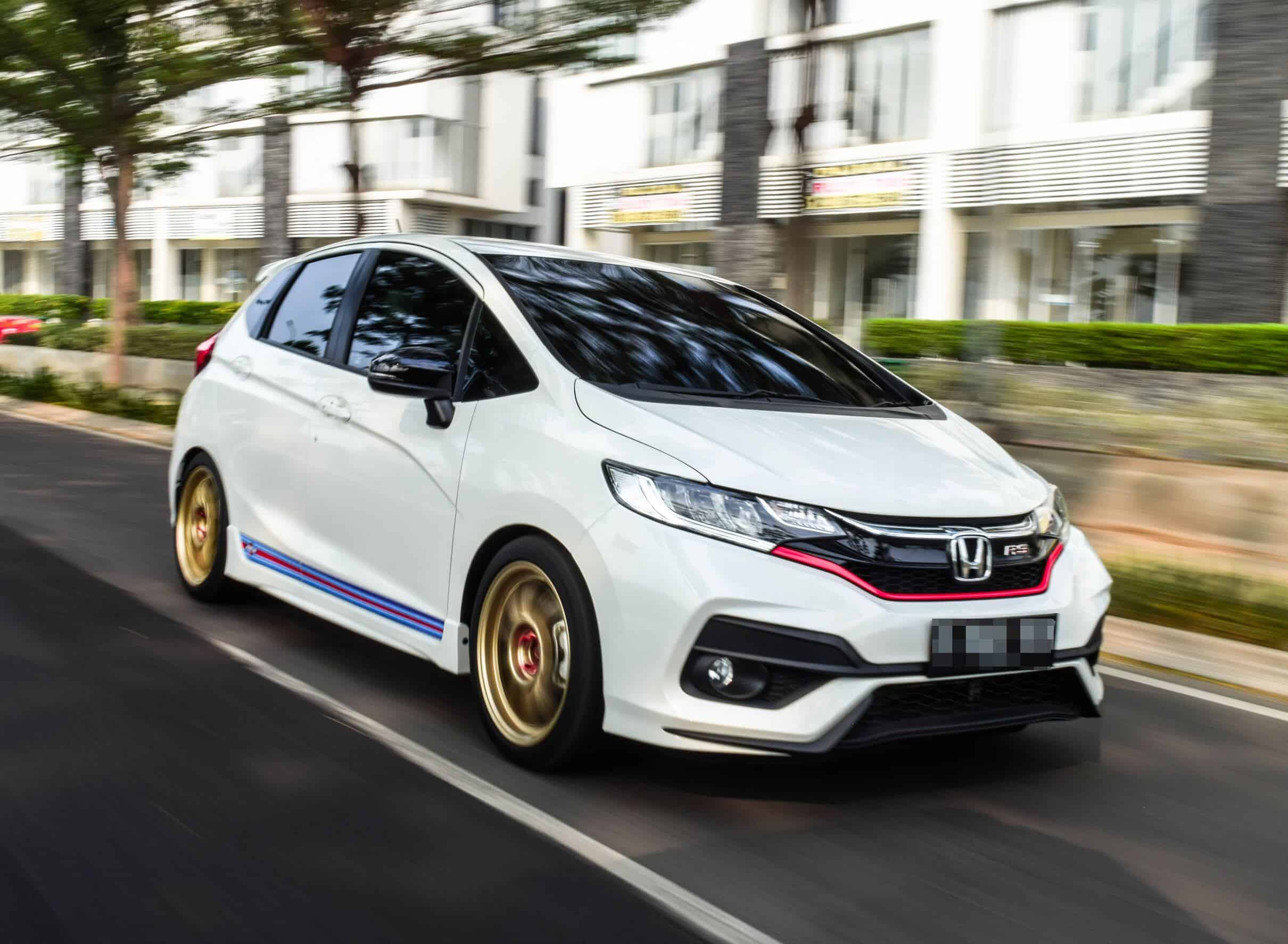 White Honda Jazz - A Stylish and Practical Compact Car.

