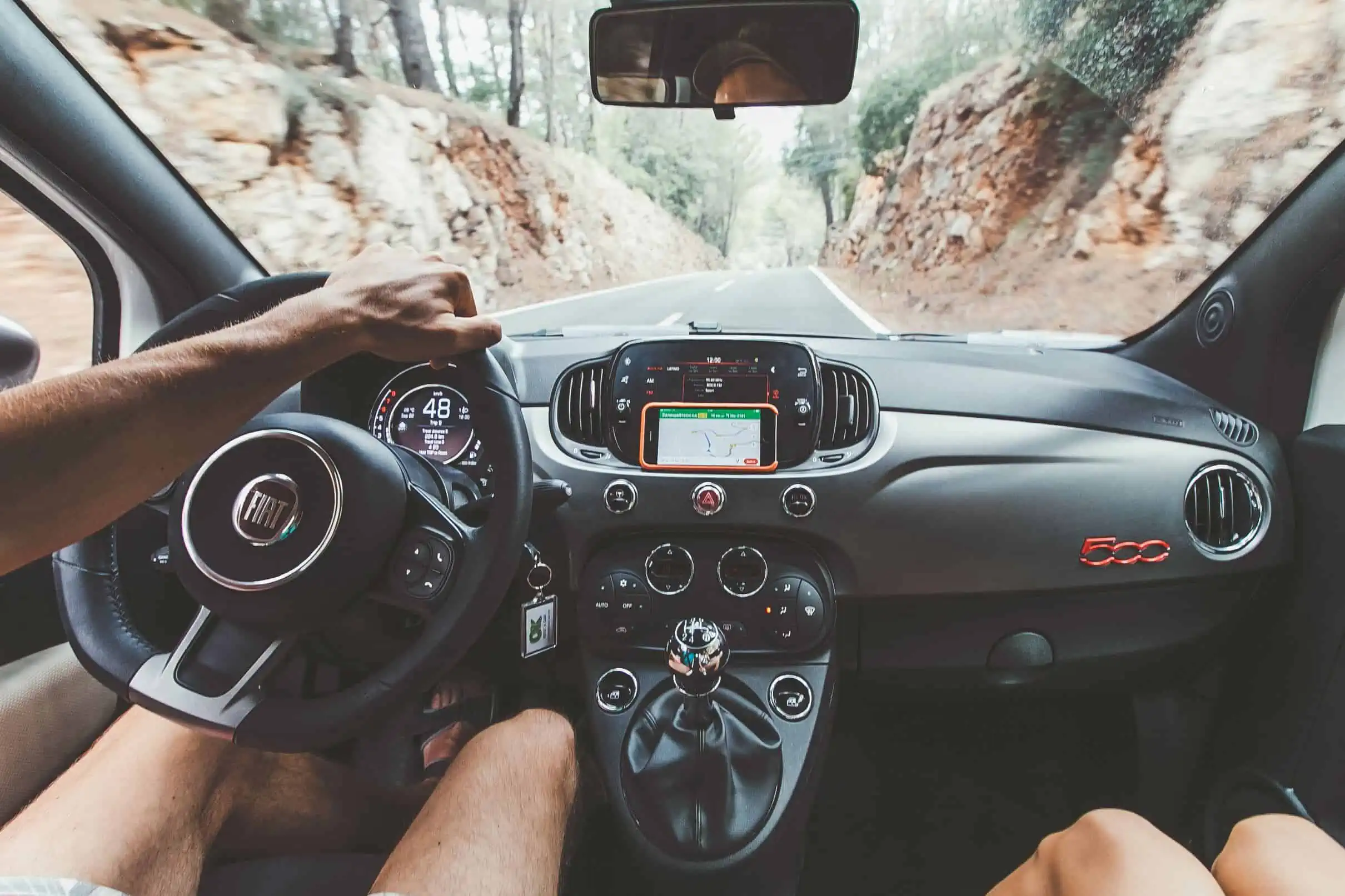 Economical White Fiat 500 - Demonstrating fuel efficiency and cost-saving attributes.