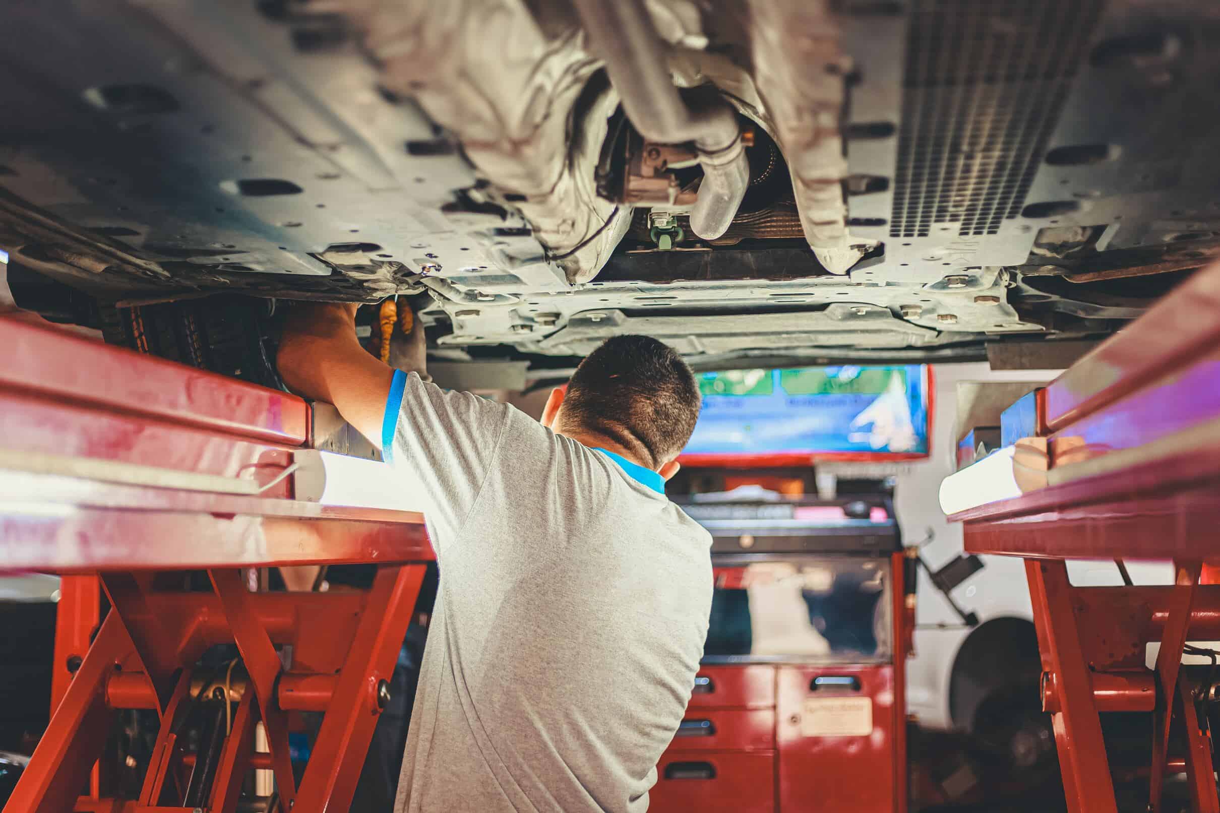 Car Mechanic - Performing Automotive Maintenance.
