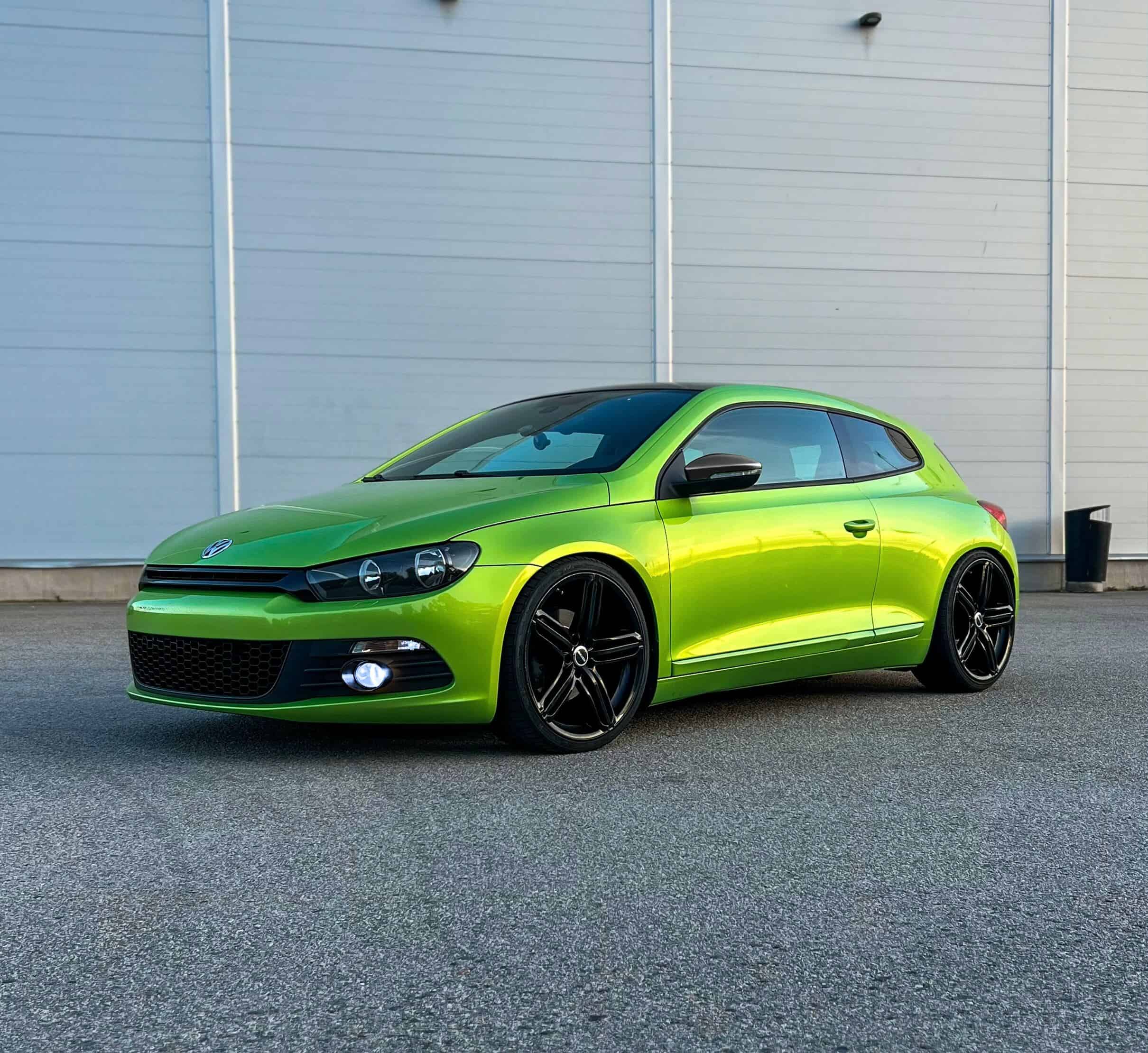 Green Volkswagen Scirocco: A sleek and dynamic coupe showcasing elegance and sporty design